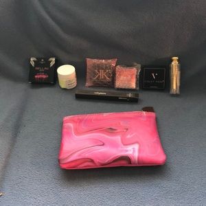 Ispy small clutch of ladies makeup products